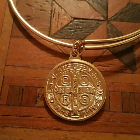 Gold Saint Benedict  charm adorned bracelet - Picture 1 of 3